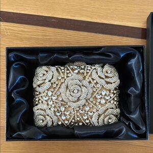 Elegant Gold Floral Clutch